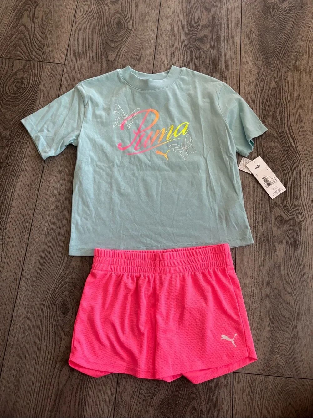 Puma Bright Pink Athletic Shorts with White Tag Detail